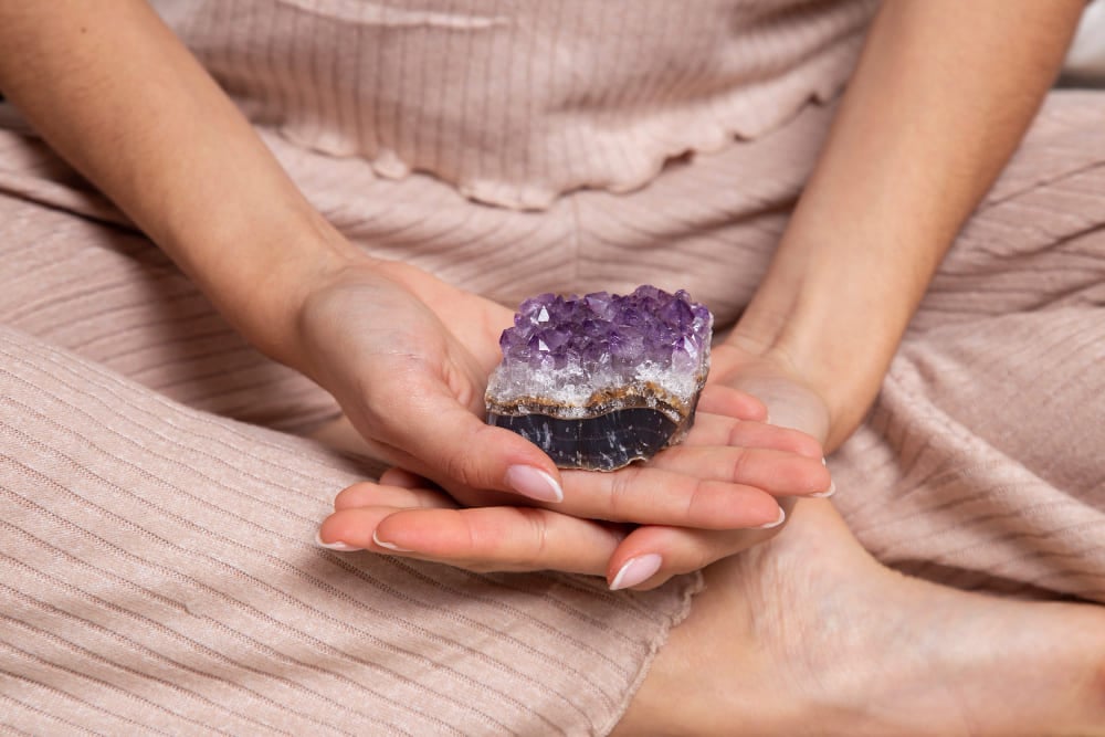holding amethyst